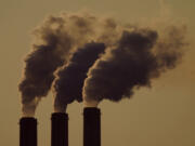 FILE - Emissions rise from the smokestacks at the Jeffrey Energy Center coal power plant as the suns sets, near Emmett, Kan., Sept. 18, 2021. The Supreme Court&#039;s conservative majority seemed skeptical Wednesday, Feb. 21, 2024, as a government lawyer argued that the Environmental Protection Agency should be allowed to continue enforcing its anti-air-pollution &quot;good neighbor&#039;&#039; rule.