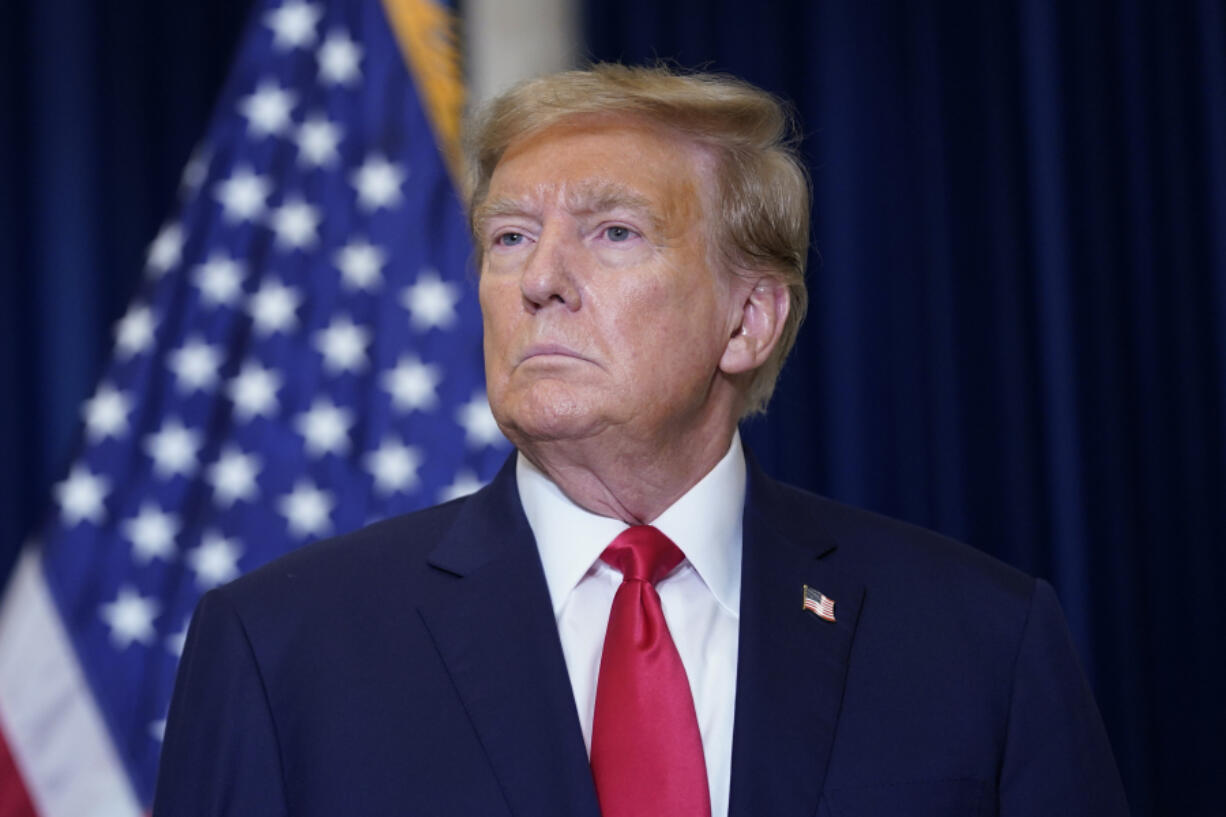 Former President Donald Trump speaks to the media at a Washington hotel, Tuesday, Jan. 9, 2024, after attending a hearing before the D.C. Circuit Court of Appeals at the federal courthouse in Washington.