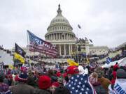 FILE - Insurrections loyal to President Donald Trump at the U.S. Capitol in Washington on Jan. 6, 2021. All eyes are on the Supreme Court in Donald Trump&rsquo;s federal 2020 election interference case.