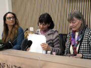Gloria Branciani, center, is flanked by lawyer Laura Sgro, left, and Mirjam Kovac, former member of the Loyola community of sisters co-founded by Father Marko Rupnik, during a press conference in Rome, Wednesday, Feb. 21, 2024. Gloria Branciani, 59, is one of the first women who accused Rev. Marko Rupnik, a once-exalted Jesuit artist of spiritual, psychological and sexual abuse. Gloria Branciani went public Wednesday to demand transparency from the Vatican and a full accounting of the hierarchs who covered Rupnik for 30 years.