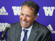 New Washington head coach Jedd Fisch laughs during an NCAA college football press conference to introduce him to the community, Tuesday, Jan. 16, 2024, in Seattle.