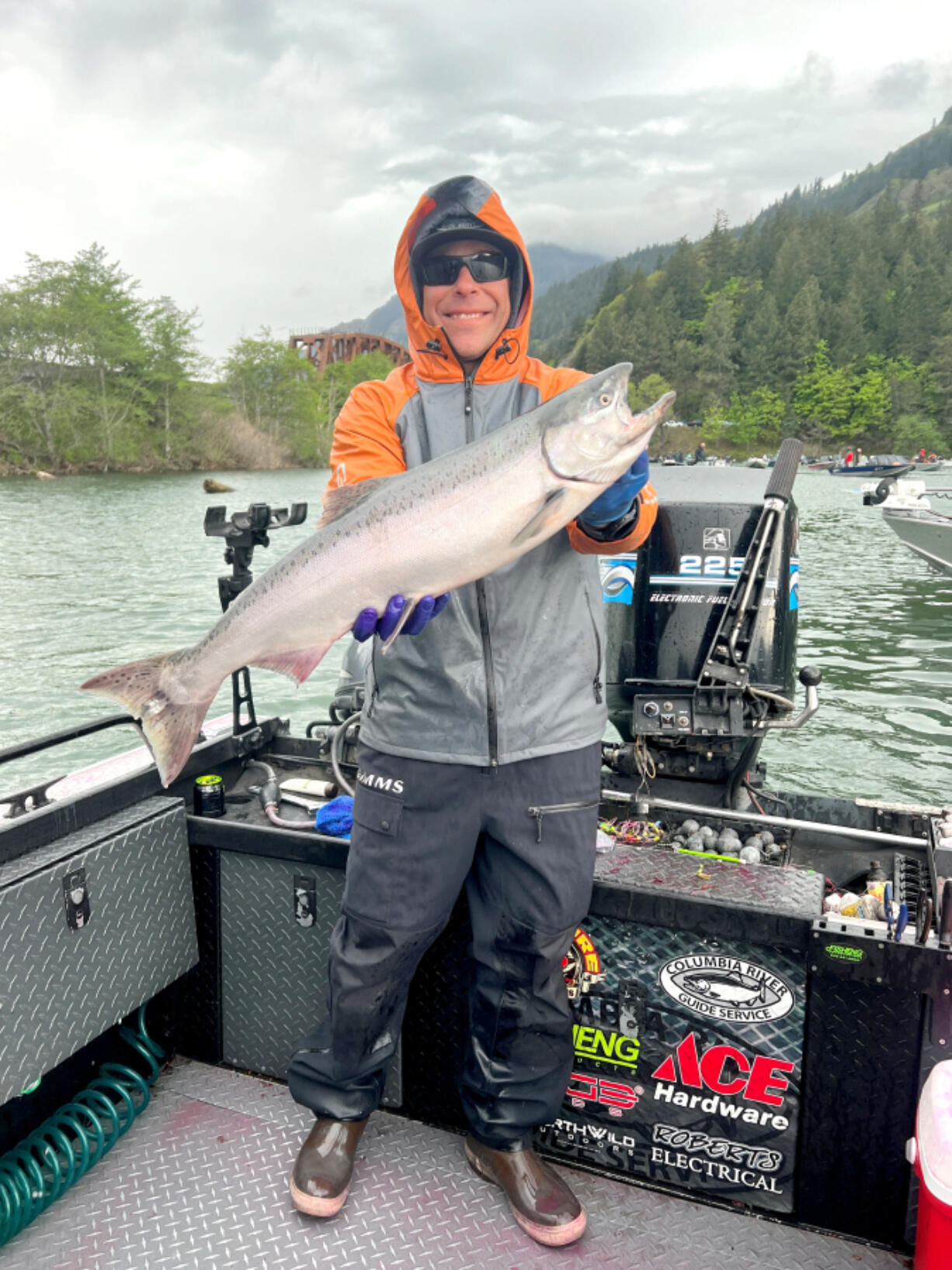 Fishing guide Chris Turvey with a spring Chinook taken in Drano Lake last year.