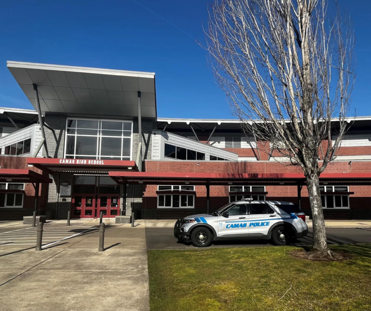 A Camas Police Department vehicle sits in front of Camas High School.