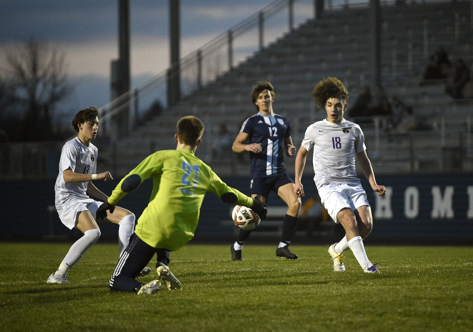 Columbia River's Mason Renner (13) and Tito Banuelos (18) go after a loose ball during a 2A GSHL boys soccer match against Hockinson on Tuesday, March 19, 2024, at Hockinson High School.