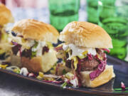 Chipotle Sliders with a colorful lettuce slaw and blue cheese dressing.