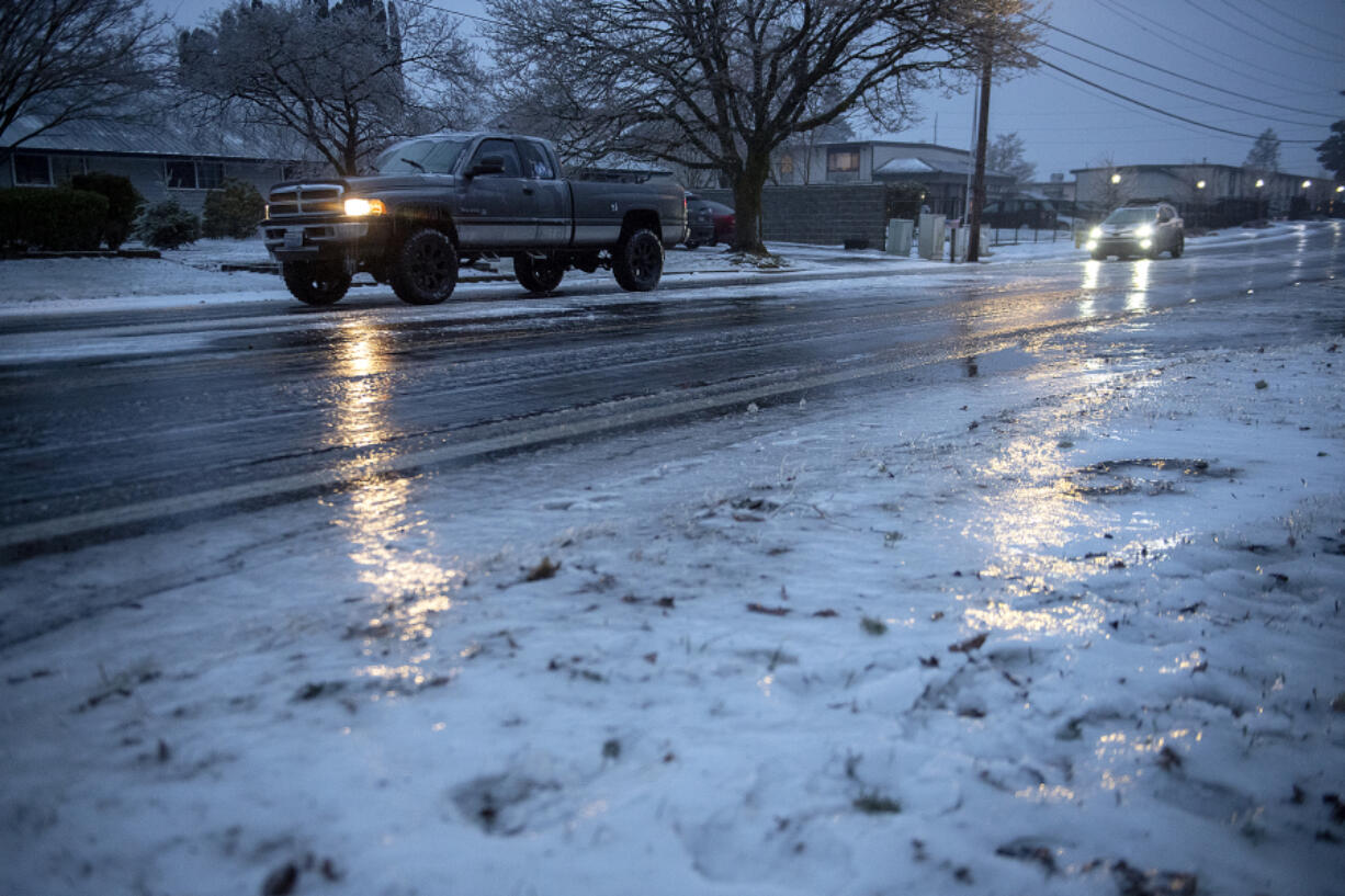 Motorists in southeast Vancouver carefully drive along icy roads Jan. 17.