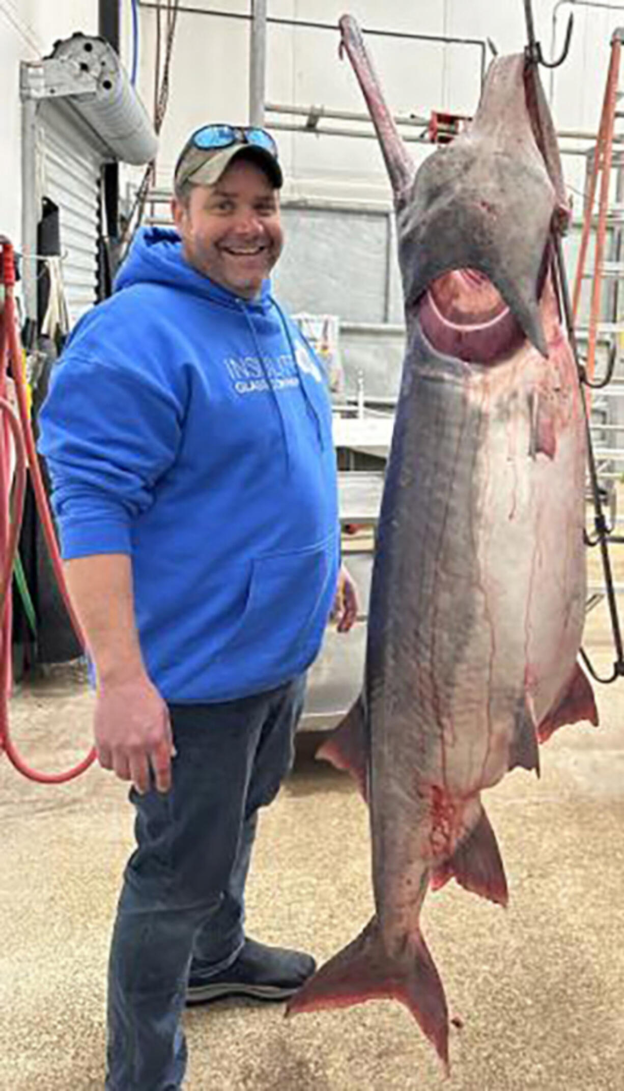 Chad Williams of Olathe, Kan., caught a world record 164-pound, 13-ounce paddlefish. Williams was on his first snagging trip March 17 when he reeled in the fish at the Lake of the Ozarks.