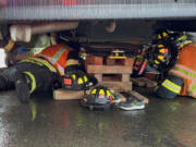 A nine-year-old boy was transported a Portland hospital with non-life-threatening injuries after colliding with an Evergreen Public Schools bus early Tuesday morning. Vancouver Fire crews used wooden blocks to suspend the bus off the ground Tuesday morning to extract a child who had been trapped underneath.