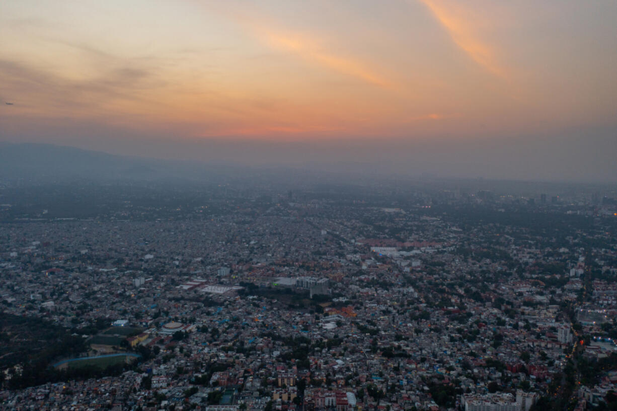 Aerial view of Mexico City on Feb. 28, 2024, in Mexico City, Mexico. Mexico City, a sprawling metropolis of nearly 22 million inhabitants, is being threatened by water crisis after the main reservoirs remain under 40% of their full capacity due to low rain fall, geography and lack of infrastructure.