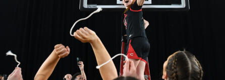Camas senior Addison Harris waves the net around her head Saturday, March 2, 2024, after the Papermakers’ 57-41 win against Gonzaga Prep in the 4A WIAA State Basketball championship game at the Tacoma Dome.