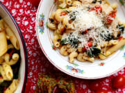 With a pound of cherry tomatoes, fresh basil, spinach and lots of garlic, this dinner has a lot of flavor but only 2 or 3 tablespoons of olive oil.