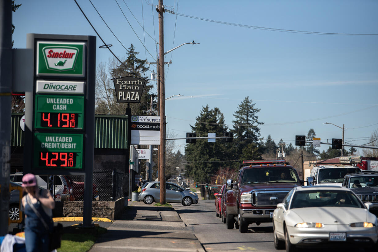 Motorists drive along the Fourth Plain corridor Monday afternoon.