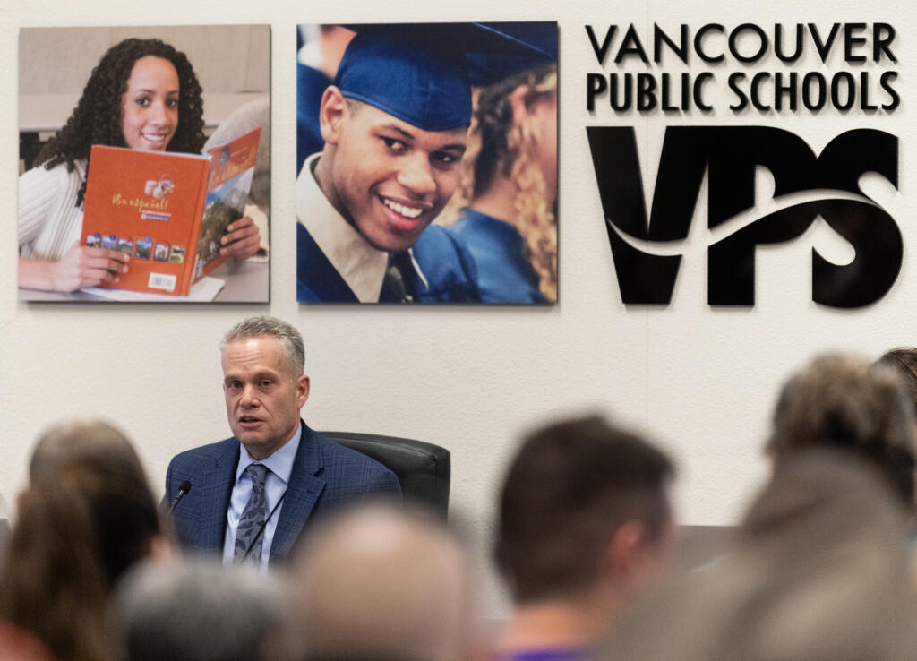 Vancouver Public Schools superintendent Jeff Snell, left, details proposed budget cuts to the district Tuesday, March 12, 2024, during a Vancouver Public Schools board meeting at the Bates Center for Educational Leadership.