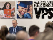 Vancouver Public Schools superintendent Jeff Snell, left, details proposed budget cuts to the district Tuesday, March 12, 2024, during a Vancouver Public Schools board meeting at the Bates Center for Educational Leadership.