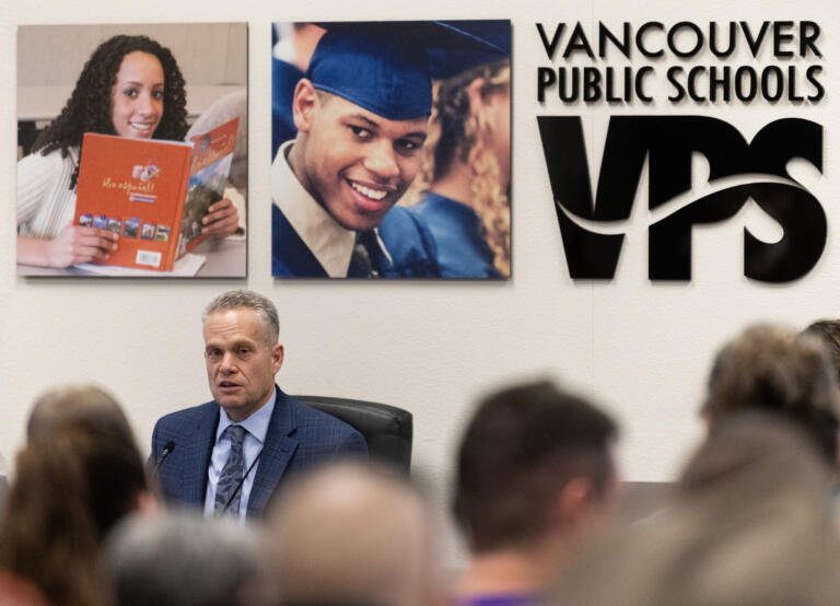 Vancouver Public Schools superintendent Jeff Snell, left, details proposed budget cuts to the district Tuesday, March 12, 2024, during a Vancouver Public Schools board meeting at the Bates Center for Educational Leadership. Near the end of the meeting, the VPS board unanimously approved $35 million in budget cuts for the district.