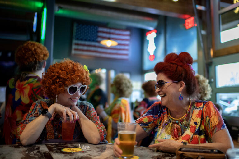 Kerry Carr of Vancouver, left, enjoys a cocktail at Playmakers Sports Bar &amp; Grill with Kat Martin, also of Vancouver, during the Mrs. Roper Pub Crawl in downtown Battle Ground on Saturday evening, March 23, 2024.