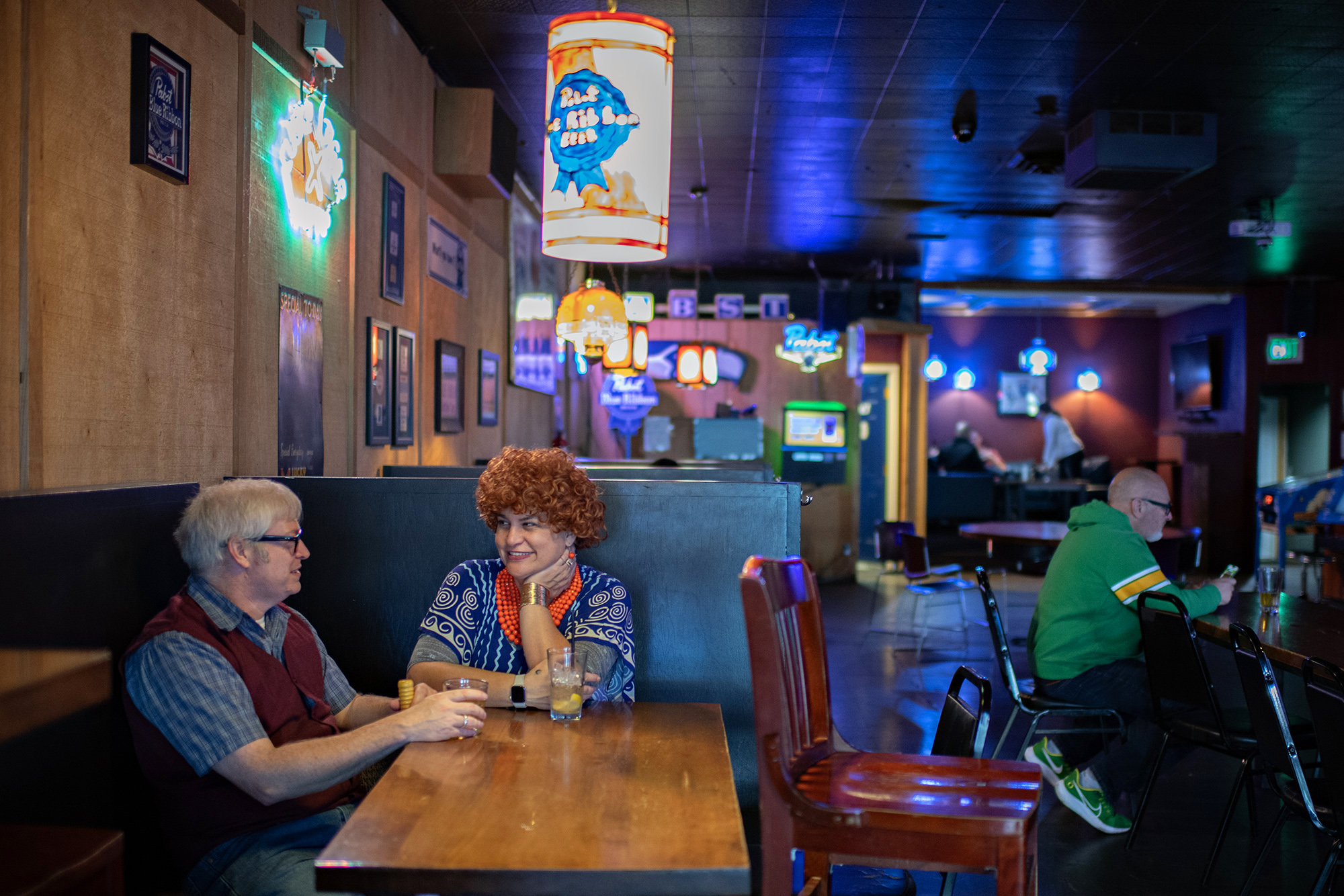 Glenn and Kirsten Gephart of Battle Ground stop by Main Street Bar for a drink while dressed as Stanley and Helen Roper during the Mrs. Roper Pub Crawl on Saturday evening, March 23, 2024.