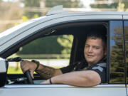 Clark County sheriff&rsquo;s Sgt. Greg Agar takes a break Thursday while on patrol at Hazel Dell Community Park. Agar was awarded recently for multiple instances of risking his own safety on the job and going above and beyond to help county citizens, even when it wasn&rsquo;t part of his job.