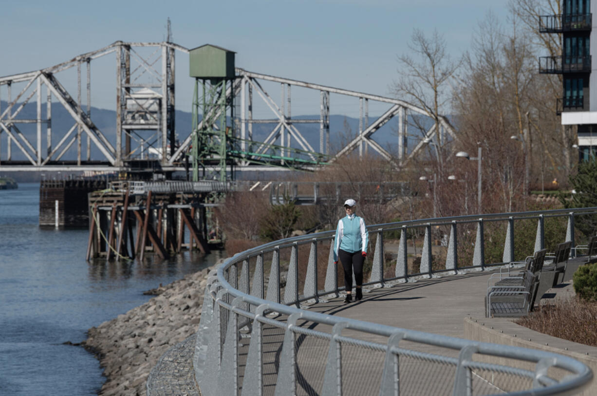 Jeanne Brower of Vancouver takes advantage of the sunny skies to enjoy a lunchtime walk along The Waterfront Vancouver on Thursday afternoon.&ldquo;I love it. It&rsquo;s absolutely beautiful,&rdquo; she said.