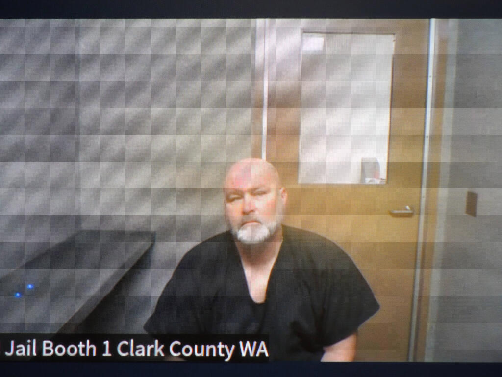 James L. Rummell, 49, appears Monday in Clark County District Court on suspicion of making a false statement to a public servant. A prosecutor said more charges against Rummell are likely because he's accused of hiring a man to kill his wife.