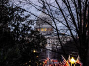 The Dome of the U.S. Capitol Building is visible from the South Lawn of the White House in Washington, Friday, March 1, 2024.