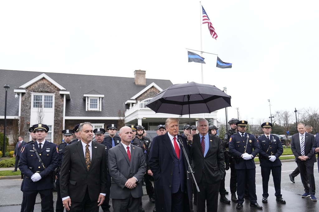 Trump attends wake of slain New York officer, calls for 'law and