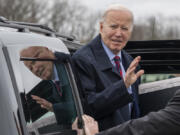 President Joe Biden waves before speakiing with reporters as he boards Air Force One, Tuesday, March 5, 2024, in Hagerstown, Md. The President is traveling to Washington.