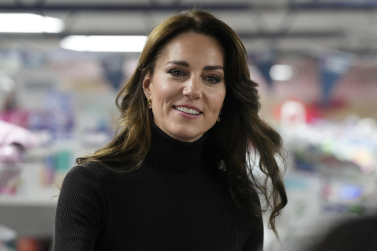 FILE - Britain&rsquo;s Kate, Princess of Wales smiles during her visit to Sebby&rsquo;s Corner in north London, Friday, Nov. 24, 2023. Princess Kate apologized Monday, March 11, 2024 for &ldquo;confusion&rdquo; caused by her editing of a family photo released by the palace &mdash; an image of the British royal and her children that was intended to calm concern and speculation about the princess&rsquo;s health, but had the opposite effect.