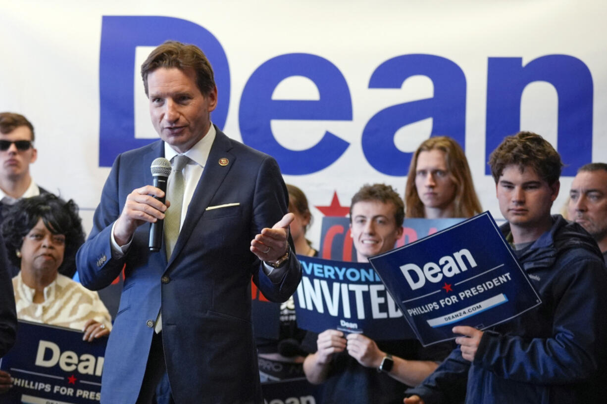 FILE - Democratic presidential candidate Rep. Dean Phillips, D-Minn., speaks during a campaign stop, Jan. 18, 2024, in Manchester, N.H.  Phillips of Minnesota ended his long-shot 2024 Democratic presidential bid on Wednesday after failing to win a primary contest against President Joe Biden.