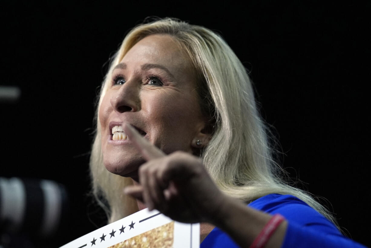 Rep. Marjorie Taylor Greene, R-Ga., talks before Republican presidential candidate former President Donald Trump speaks at a campaign rally Saturday, March 9, 2024, in Rome Ga.