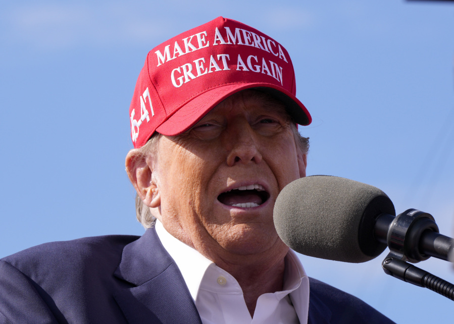 FILE - Republican presidential candidate former President Donald Trump speaks at a campaign rally March 16, 2024, in Vandalia, Ohio. Trump&#039;s new joint fundraising agreement with the Republican National Committee directs donations to his campaign and a political action committee that pays the former president&#039;s legal bills before the party gets a cut, according to a fundraising invitation obtained by The Associated Press.