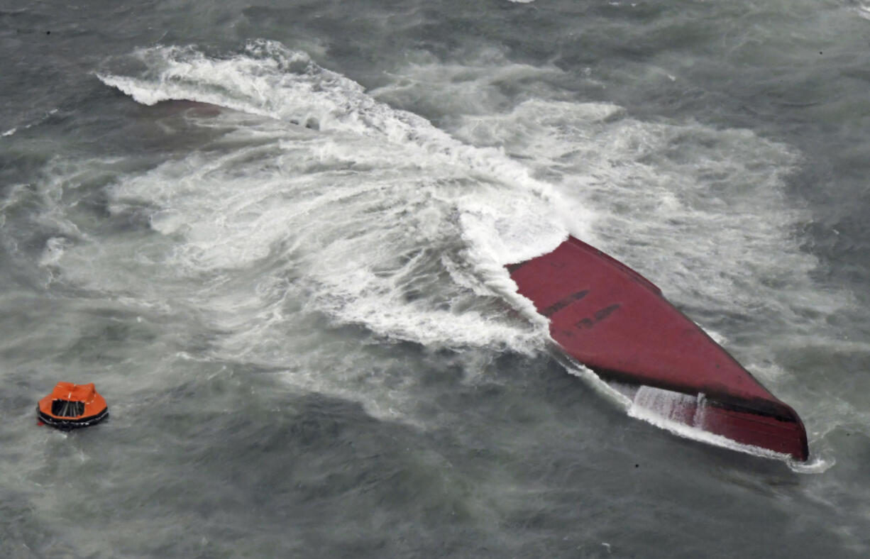 A South Korean tanker is seen capsized off Mutsure Island, Yamaguchi prefecture, southwestern Japan Wednesday, March 20, 2024. The coast guard said it received a distress call from the Keoyoung Sun chemical tanker, saying that it was tilting and was taking refuge near the Island.