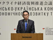 Japanese Prime Minister Fumio Kishida delivers a speech during the Japan-Ukraine Conference for Promotion of Economic Growth and Reconstruction at Keidanren Kaikan building in Tokyo, Monday, Feb. 19, 2024.