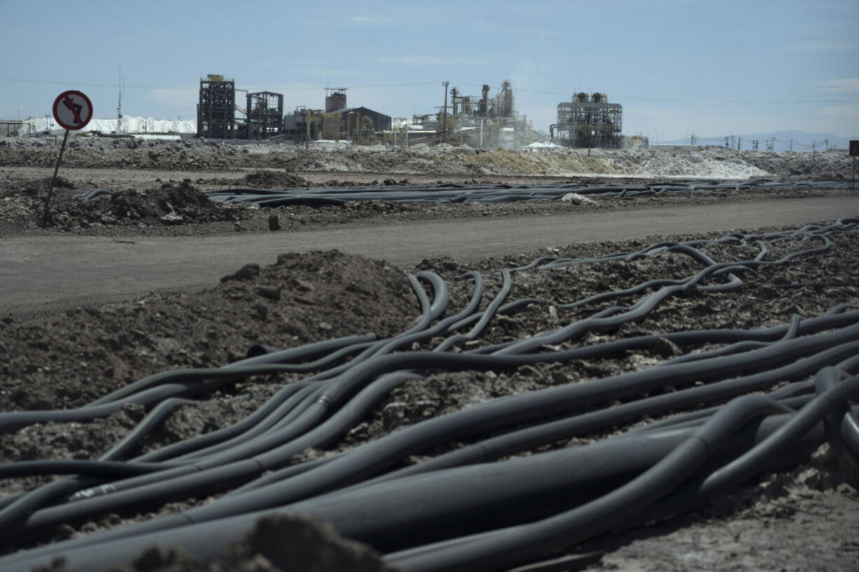 Tubes lie on the grounds of the lithium extraction plant facilities of the SQM Lithium company near Peine, Chile, Thursday, April 18, 2023. At least 1,280 liters of salted groundwater a second &ndash; somewhere between 6 to 8 bathtubs &ndash; are pumped according to the mine&rsquo;s numbers. Water converges at rows of blue, green and yellow pools, where lithium-concentrated water is passed from pool-to-pool.