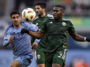 Portland Timbers defender Kamal Miller (4) tracks down a ball against the New York City FC during an MLS soccer match, Saturday, March 9, 2024, in New York.