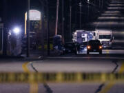 FILE - Police tape cordons off the road to Schemengees Bar and Grille as law enforcement officers maintain their presence in the aftermath of a mass shooting by Army reservist Robert Card in Lewiston, Maine, Oct. 27, 2023. Army officials testified, Thursday, March 7, 2024, before a special commission investigating the deadliest mass shooting in Maine history, which was committed by Card.