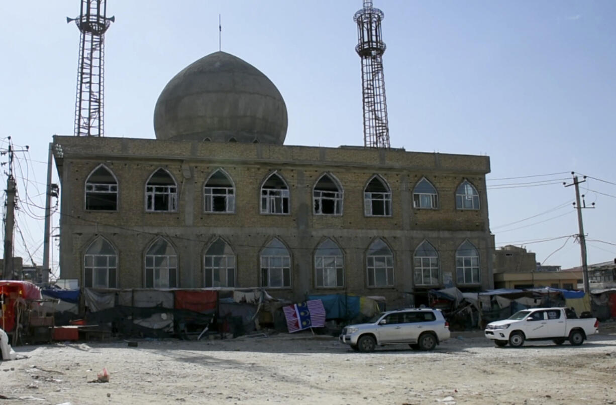 FILE - This frame grab image from video shows upper floor windows blown out after a bomb explosion inside a mosque that had all the hallmarks of a deadly Islamic State affiliate known as Islamic State in Khorasan, Province, in Mazar-e-Sharif province, Afghanistan, Thursday, April 21, 2022. The top U.S. commander for the Mideast told a Senate committee Thursday, March 7, 2024, that exploding violence in the Middle East, fueled by Iran, presents the most likely threat to the U.S. homeland, and the risk of an attack by violent extremists in Afghanistan on American and Western interests abroad is increasing.