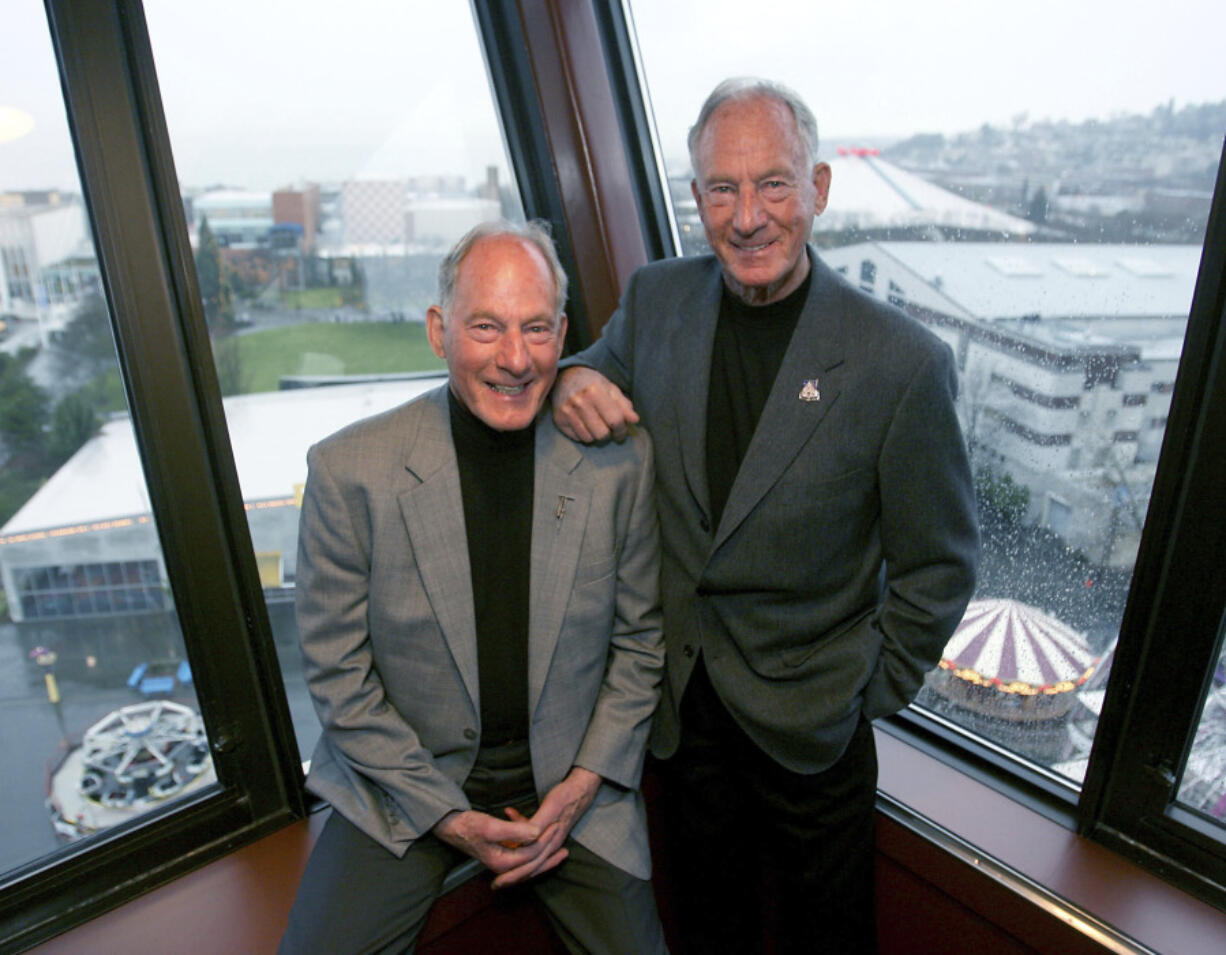 FILE - Legendary Seattle mountain climbers twin brothers Jim, left, and Lou Whittaker celebrate their 80th birthday with a party at the Space Needle in Seattle, Tuesday Feb. 10, 2009. Lou Whittaker, a Seattle-born and -raised mountaineer and glacier travel guide who climbed Mount Rainier more than 250 times, died Sunday, March 24, 2024. He was 95.