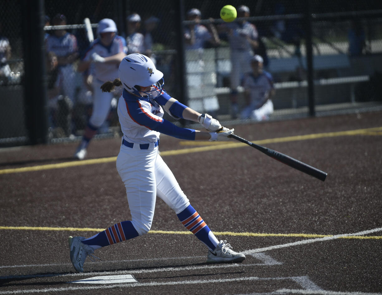 Mallory Vancleave of Ridgefield fouls off a pitch during a game against Olympic at the Ridgefield Outdoor Recreation Center on Saturday, March 16, 2024.