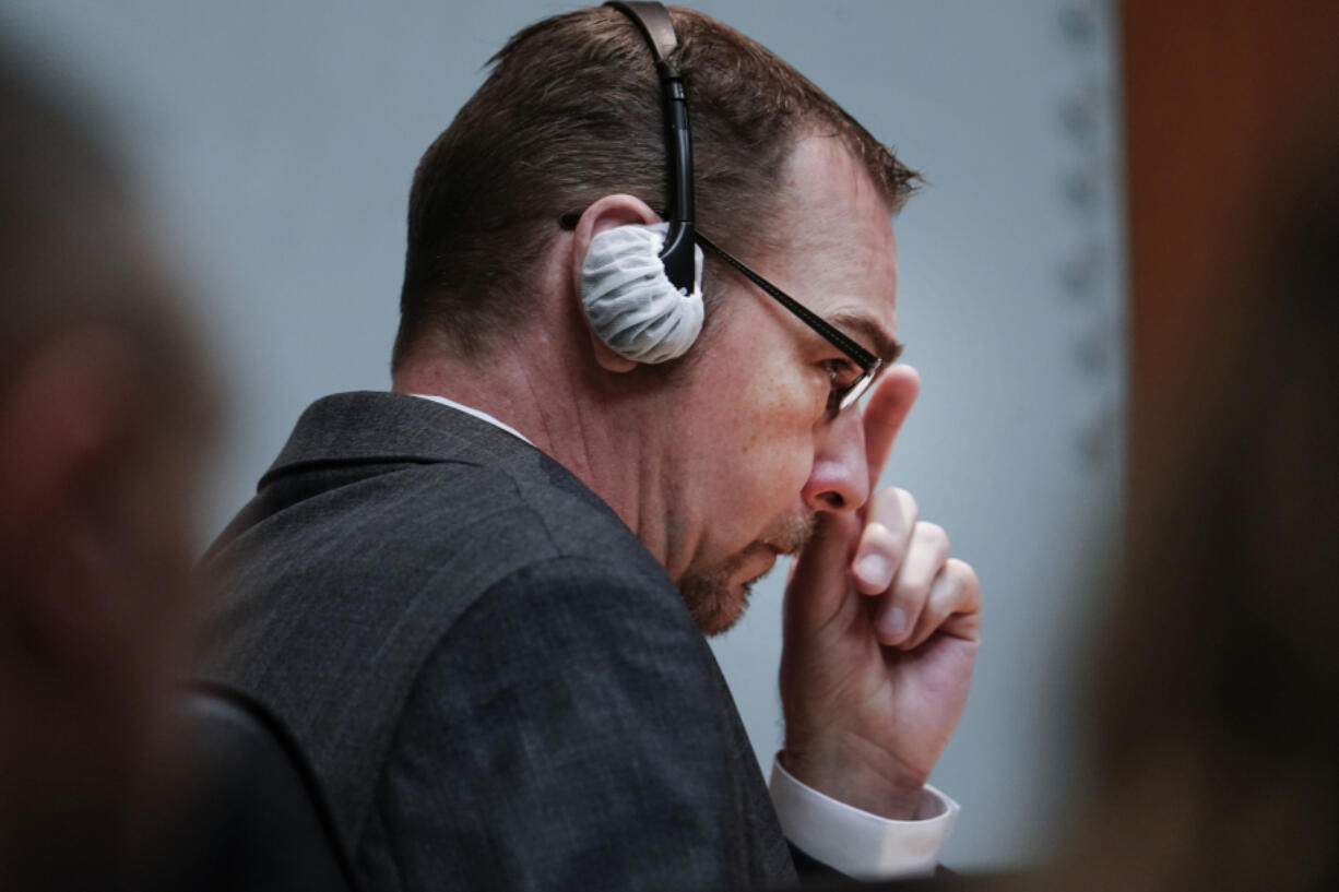 James Crumbley sits with his attorney Mariell Lehman in the Oakland County courtroom of Cheryl Matthews during his trial on Thursday, March. 7, 2024 in Pontiac, Mich.  James Crumbley, 47, is charged with four counts of involuntary manslaughter, one for each teenager killed by Ethan Crumbley at Oxford High School in 2021.