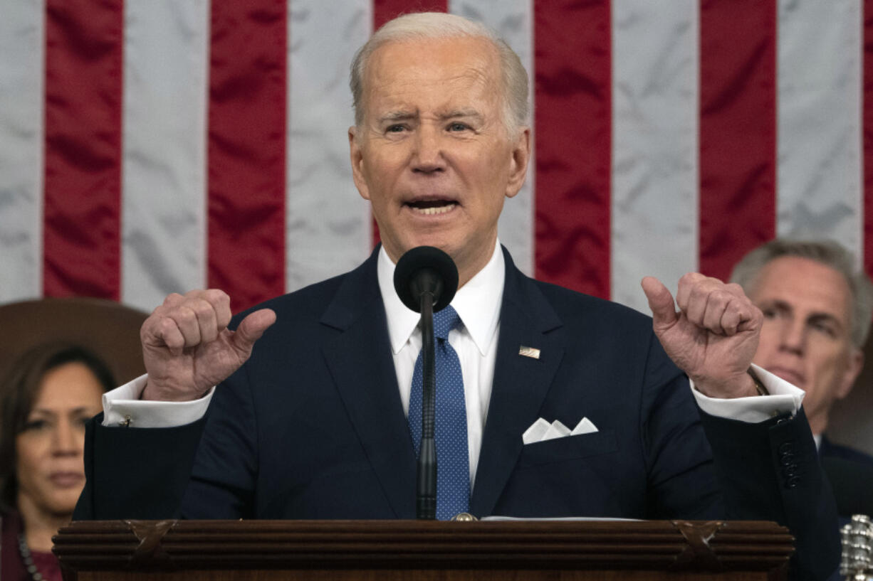 FILE - President Joe Biden delivers the State of the Union address to a joint session of Congress at the U.S. Capitol, Feb. 7, 2023, in Washington, as Vice President Kamala Harris and House Speaker Kevin McCarthy of Calif., listen. Biden is set to use his State of the Union address to promote his vision for a second term to a dispirited electorate that questions whether he&rsquo;s up to the job and to warn that GOP frontrunner Donald Trump would be a dangerous alternative.