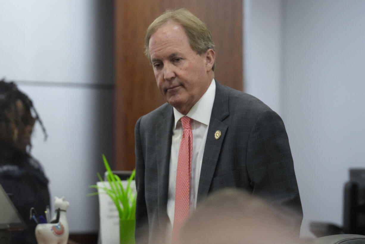 Texas Attorney General Ken Paxton appears at a pretrial hearing in his securities fraud case before state District Judge Andrea Beall, Tuesday, March 26, 2024 at Harris County Criminal Courts at Law in Houston.  Prosecutors announced an agreement with Paxton that would ultimately dismiss securities fraud charges he has been facing for nearly a decade.