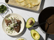 Black Bean Enfrijoladas draws on pantry staples for an easy meal.