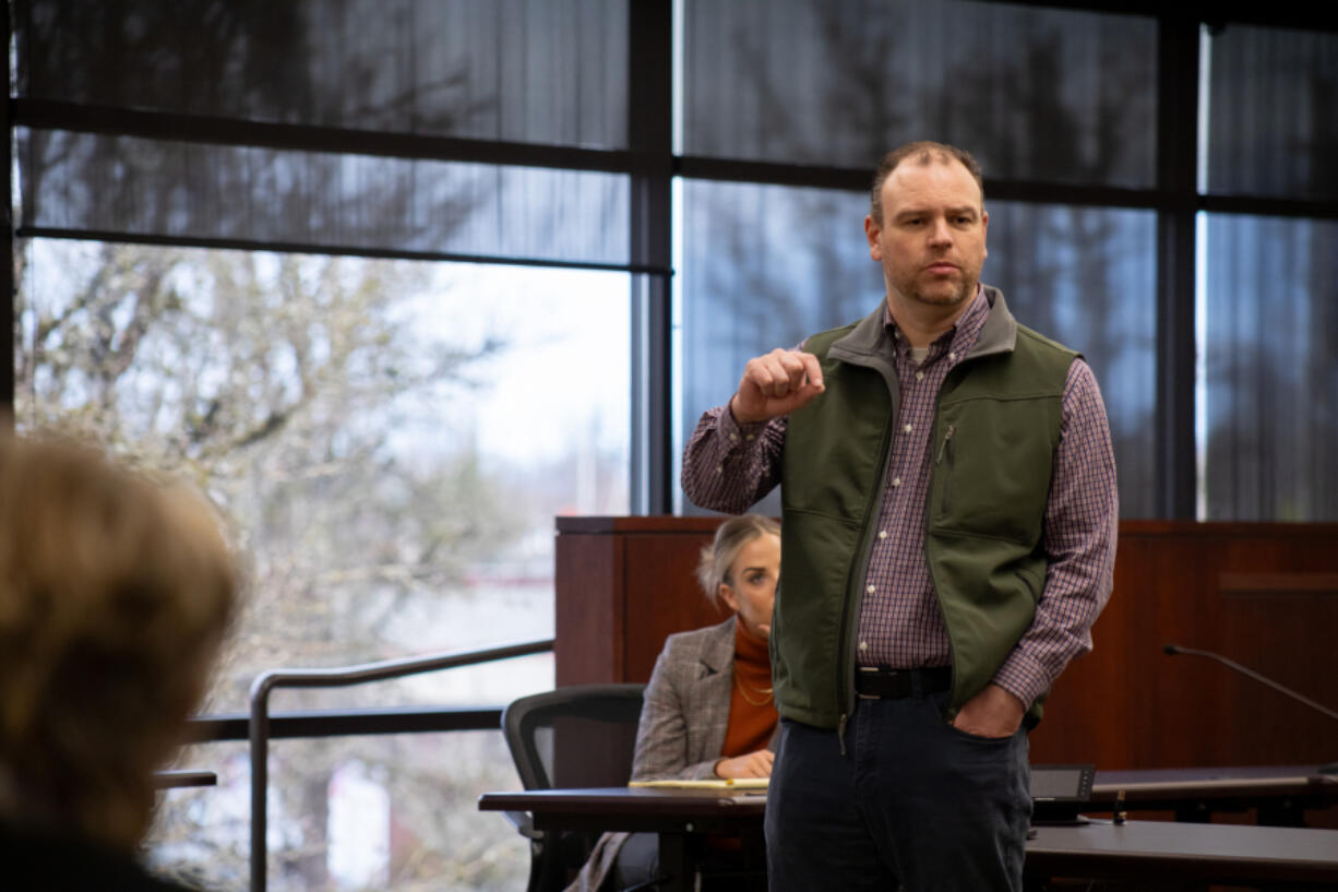 Greg Cheney, a representative for the 18th legislative district, talks to constituents about their concerns at a town hall in Battle Ground on February 17, 2024.