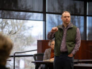 Greg Cheney, a representative for the 18th legislative district, talks to constituents about their concerns at a town hall in Battle Ground on February 17, 2024.