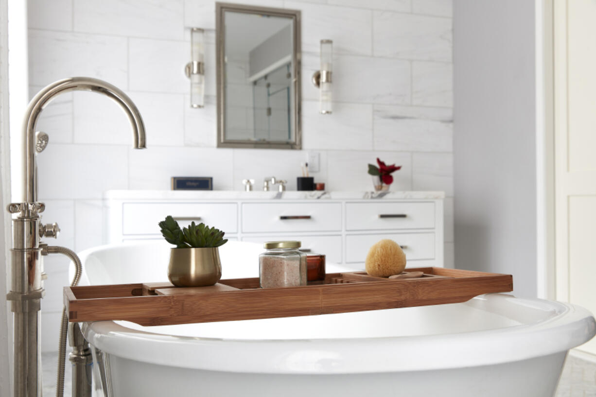 Satin nickel fixtures provide both warmth and elegance in this bathroom.