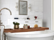 Satin nickel fixtures provide both warmth and elegance in this bathroom.