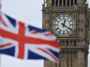 A Union flag flies near the Elizabeth Tower, commonly referred to as Big Ben, at the Houses of Parliament in London on March 29, 2017.