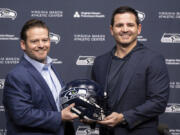 Seattle Seahawks general manager John Schneider, left, and new head coach Mike Macdonald will be side-by-side for the NFL draft.