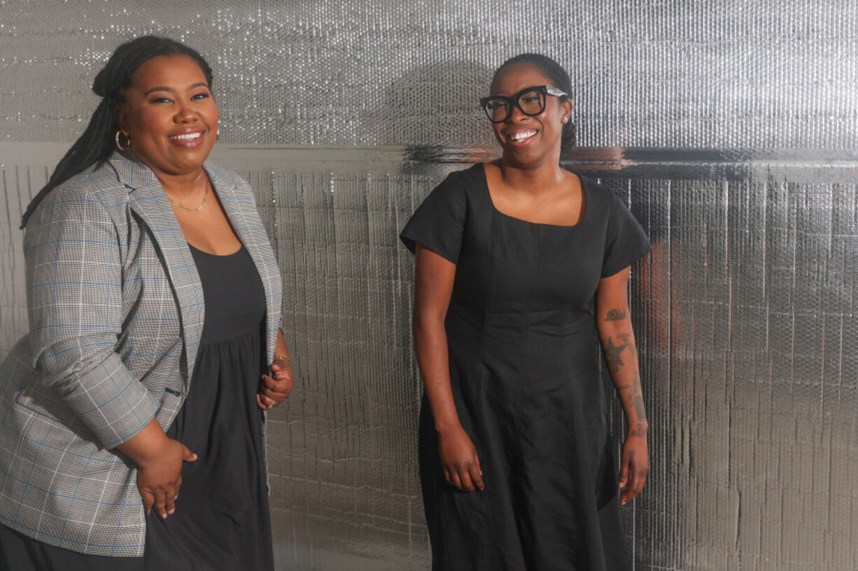 ChargerHelp co-founders Evette Ellis, left, and Kameale Terry, right, at their headquarters on March 27, 2024, in Los Angeles.